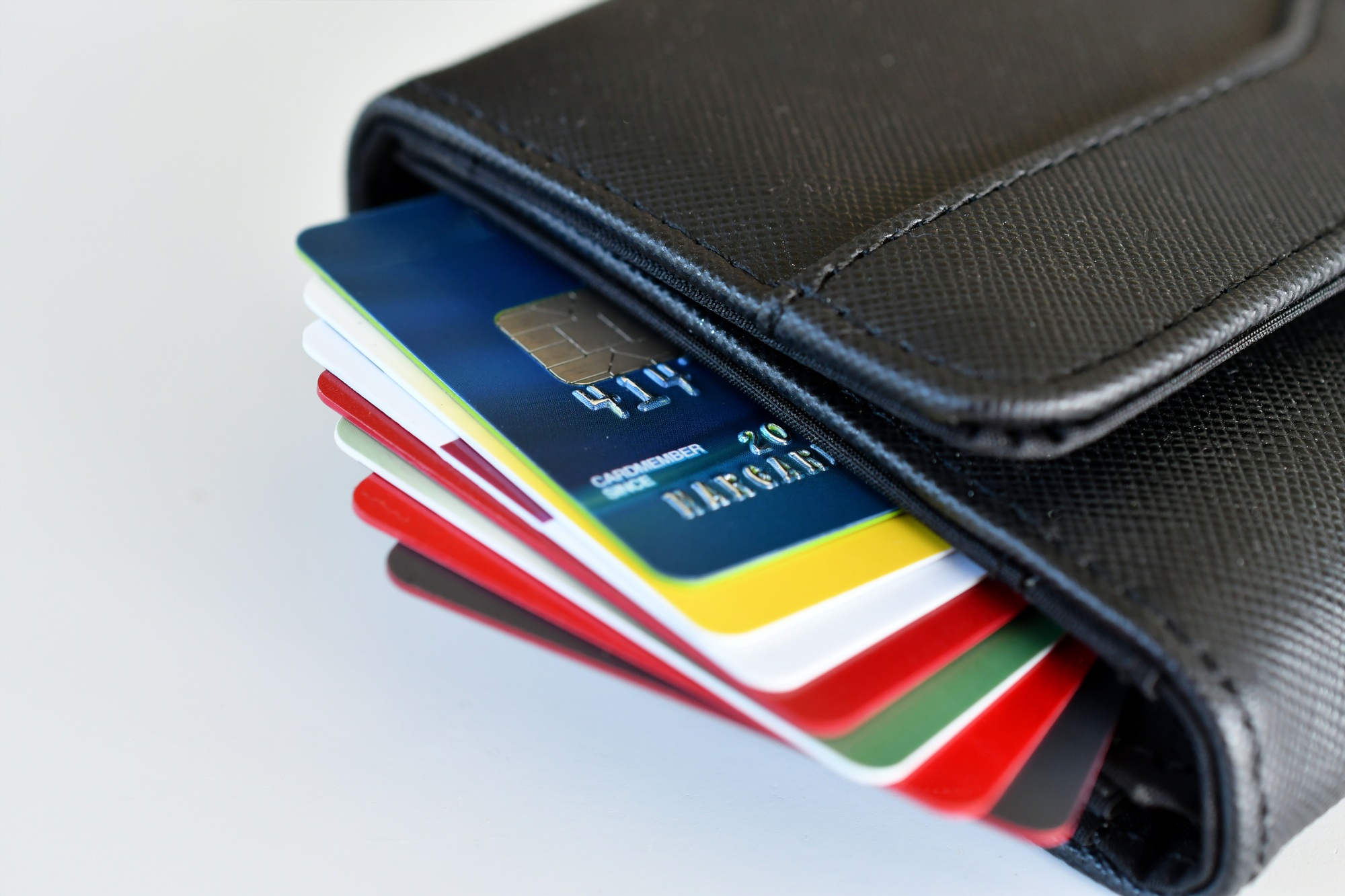 Credit card - stack of credit cards in wallet shopping, spending, purchasing, credit rating score