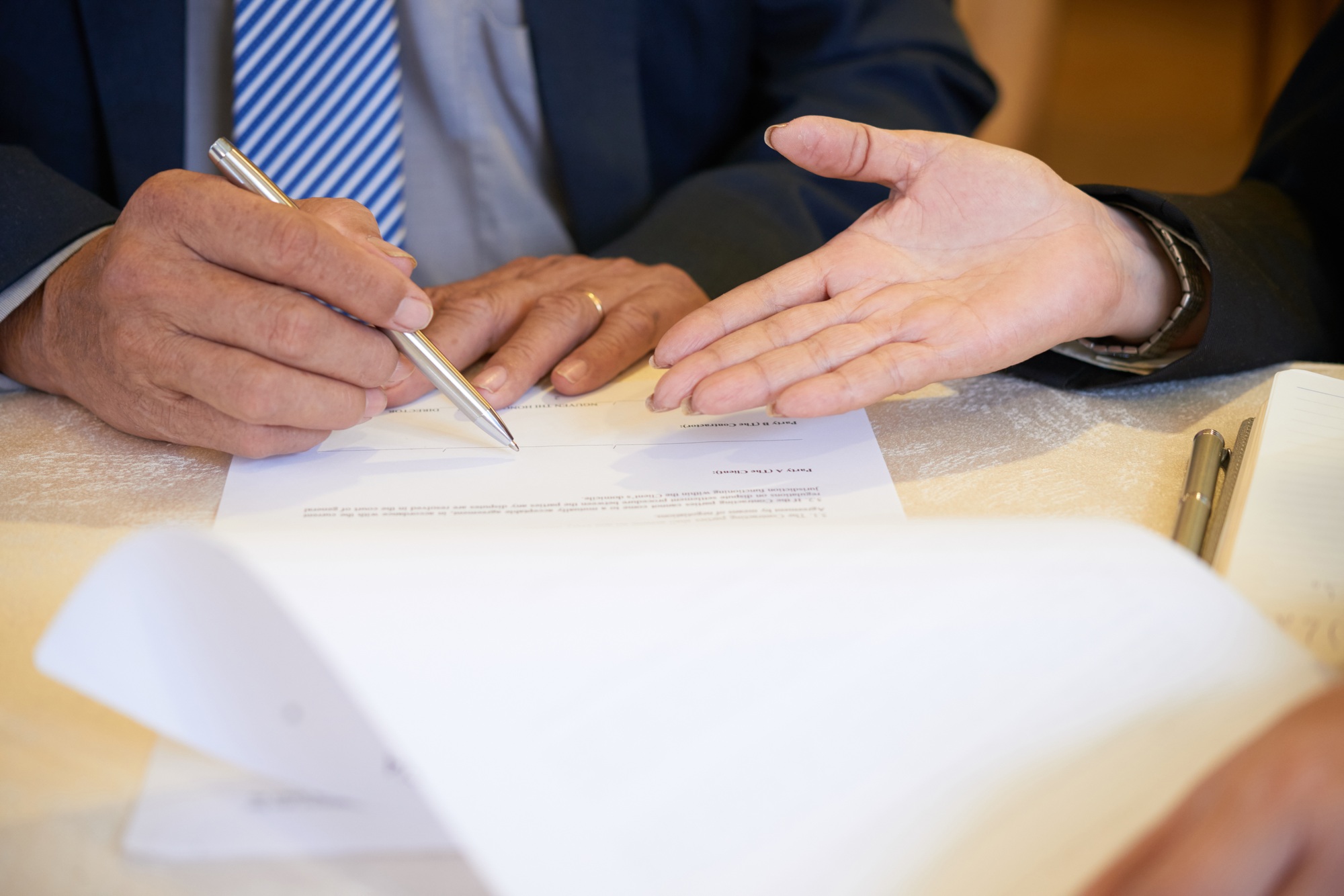 Business Partners Signing Documents